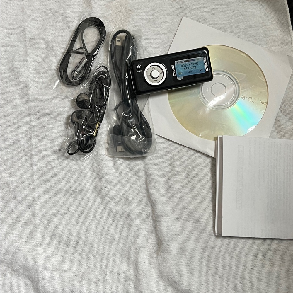 SanDisk Sansa MP3 Player with Accessories